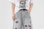 Mid Rise Washed Distressed Denim Shorts