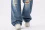 Mid Rise Washed Distressed Wide Leg Jeans